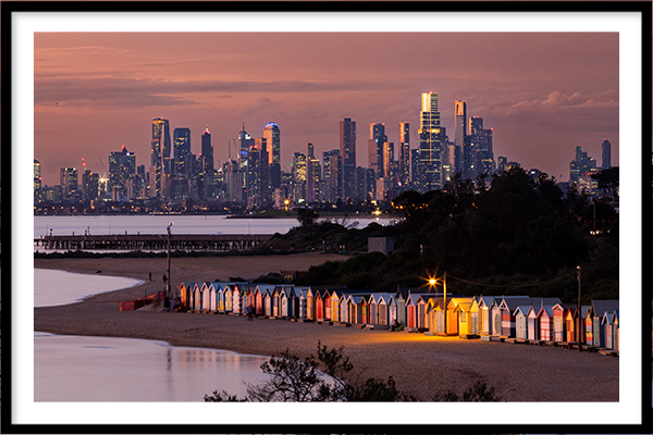 Brighton Bathing Boxes image at dusk with Melbourne CBD in the background with a black frame
